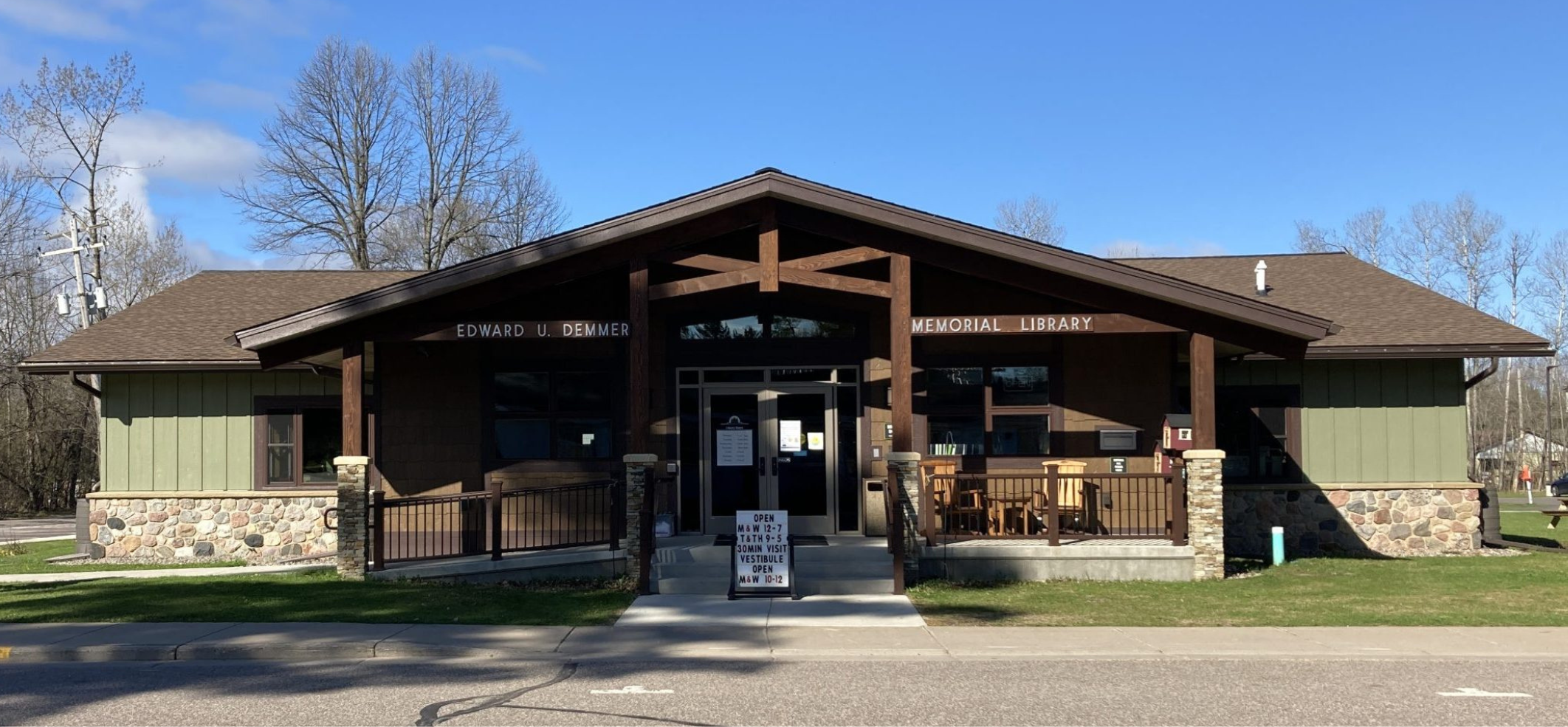 photograph of the front entrance to the demmer memorial library after the building remodel was complete very closely resembling the architectural rendering